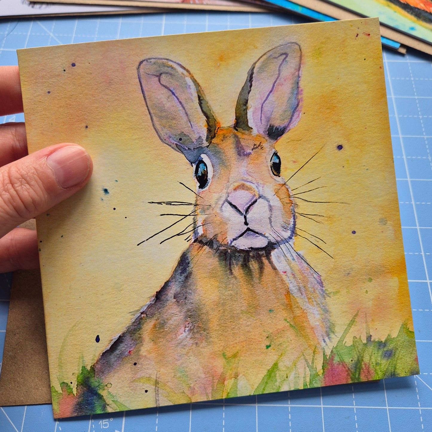 Hare greeting card with vibrant yellow background by Jagos Art