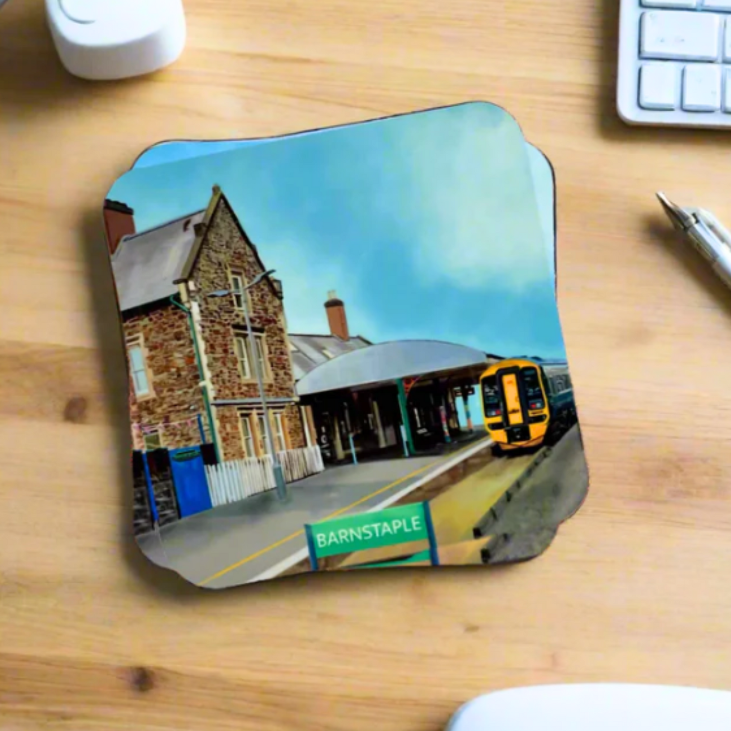 coaster of Barnstaple Train Station with train and station masters house