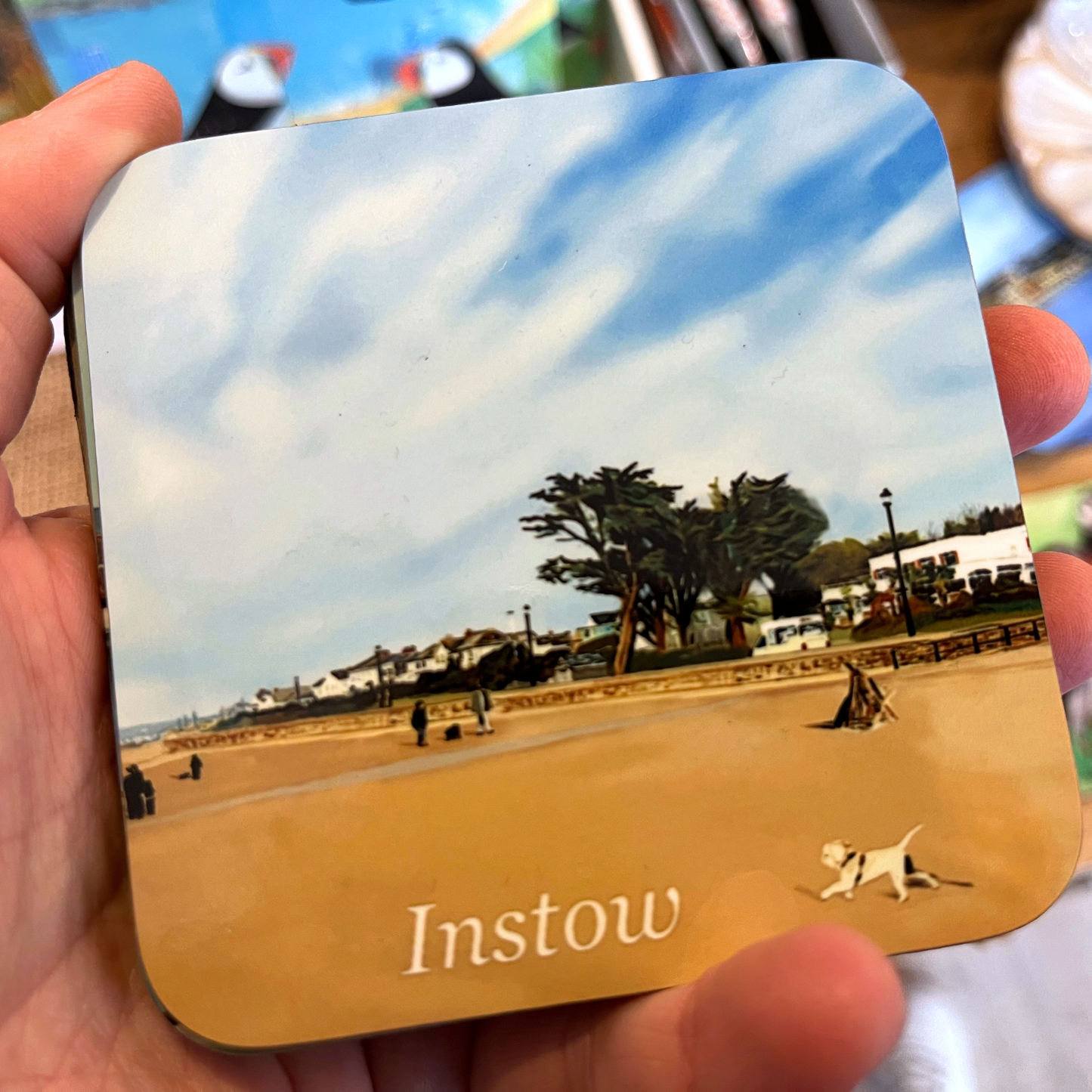 Instow beach North Devon coaster with sand, pine trees and the commodore hotel by Jagos Art held in hand