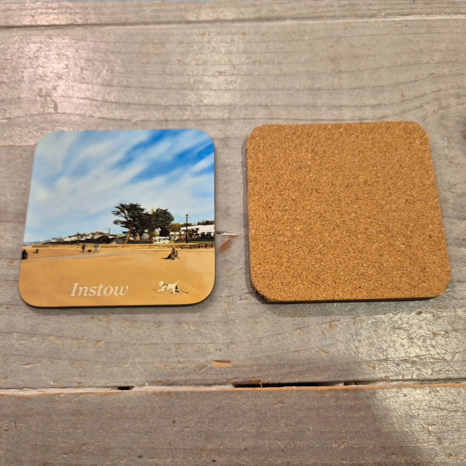 Instow Beach coaster by Jagos Art golden sands, blue sky, pine trees and cork back