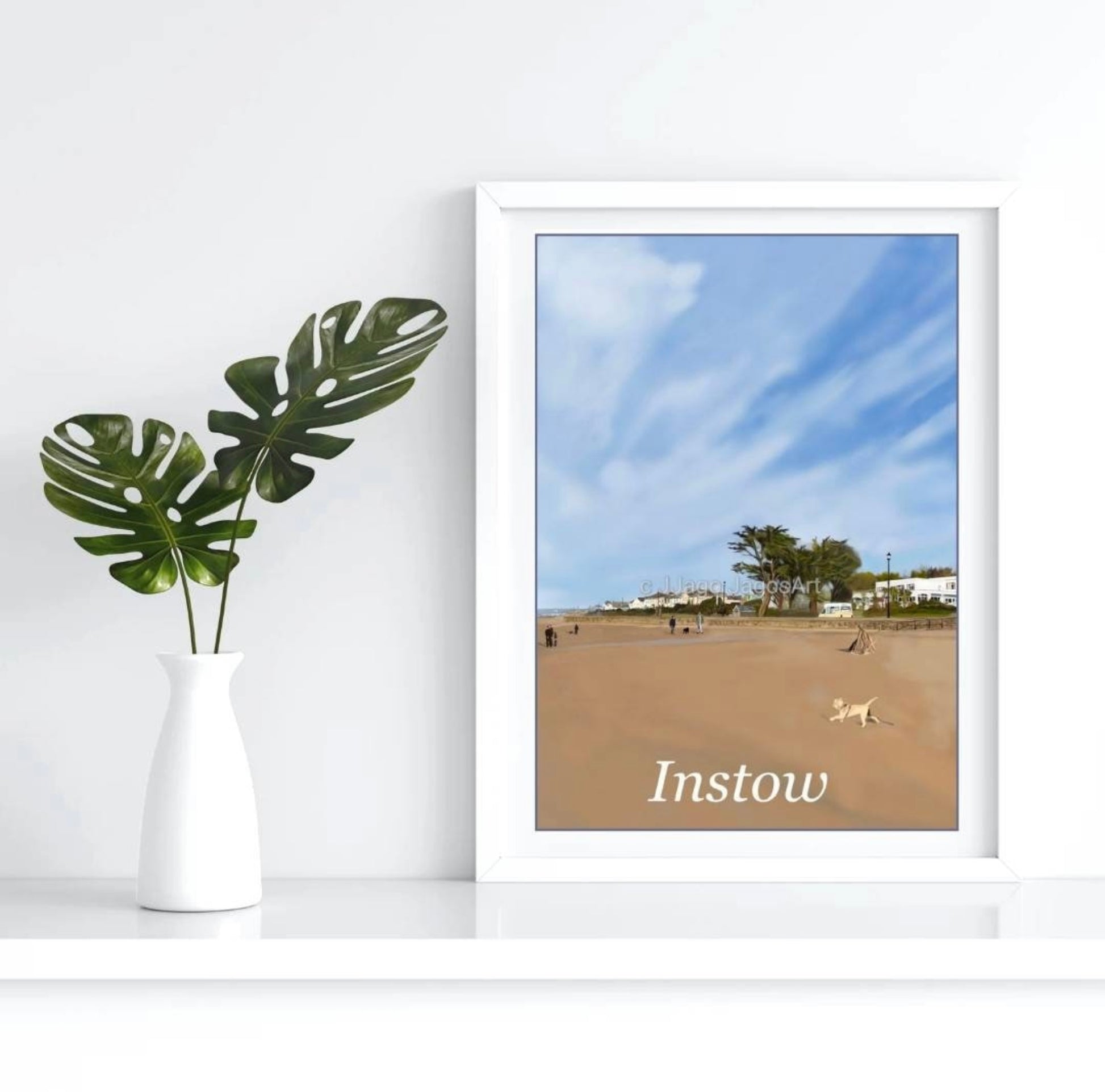 an art print of Instow in north Devon featuring the beach with a small dog running on the sand, the Commordore Hotel and a Hockings ice-cream van