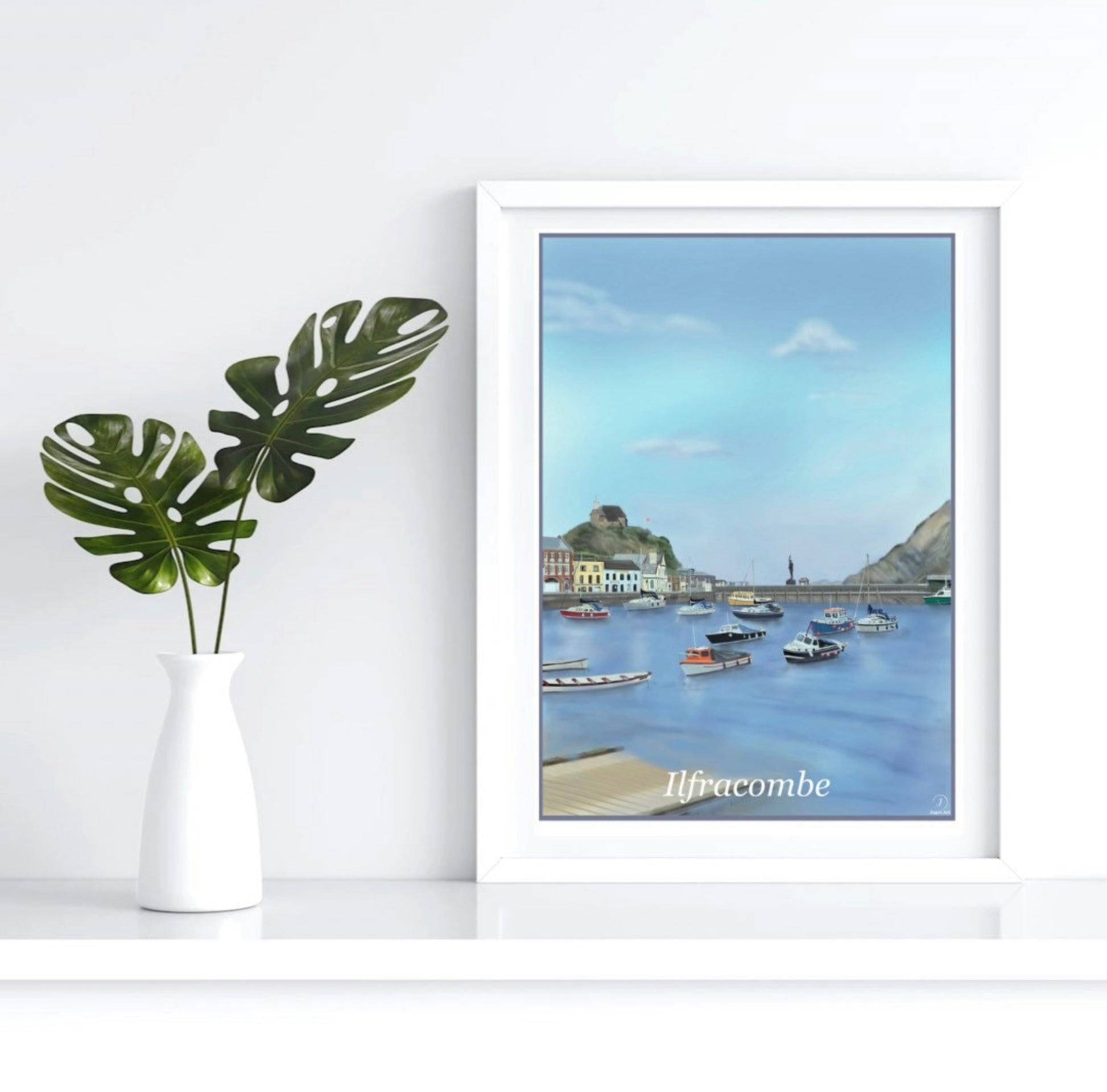 an art print of the harbour in Ilfracombe by Jagos Art featuring a dozen small fishing boats, the church on the hill and the statue of Verity in the distance