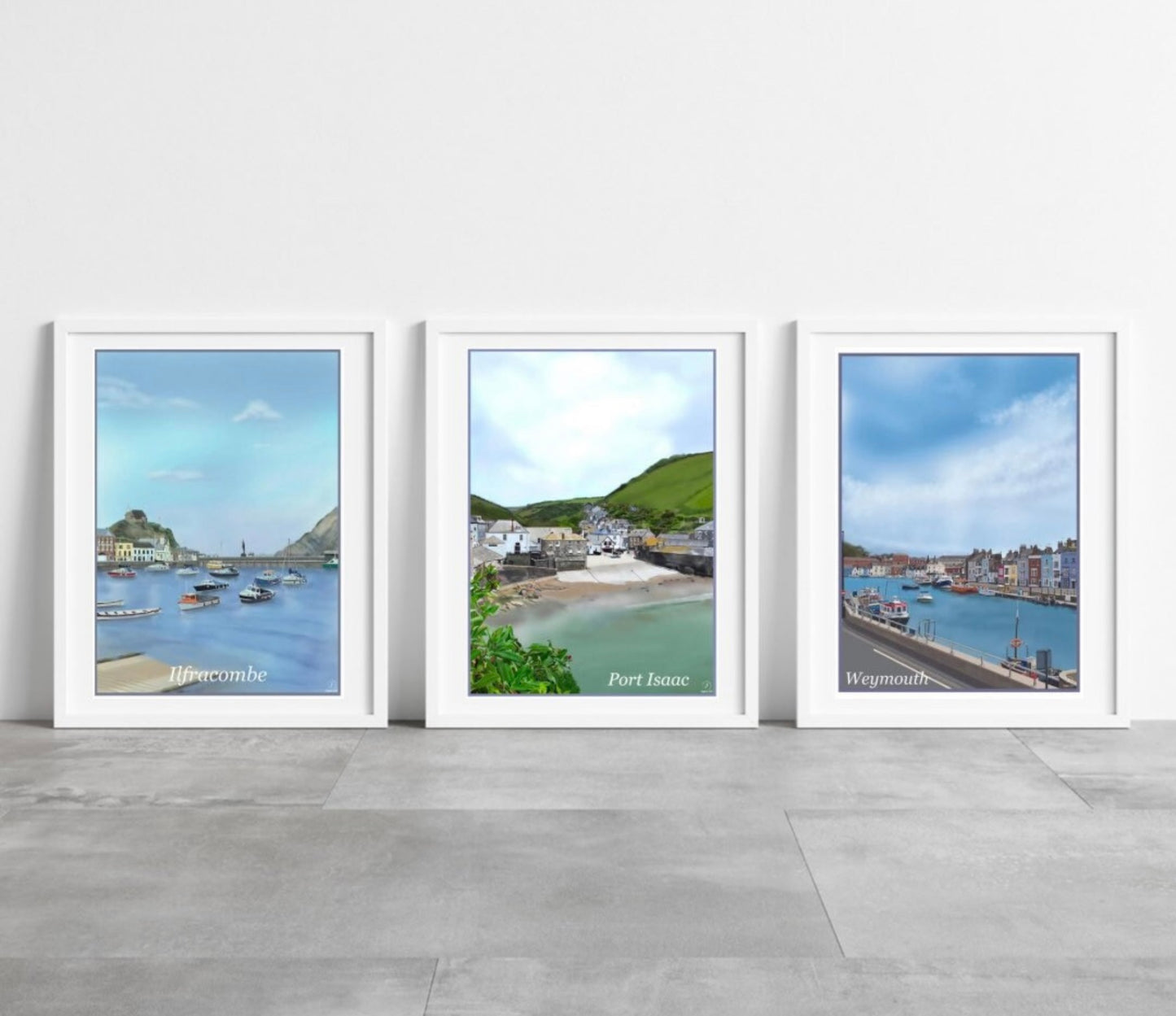 a photo showing an art print of Ilfracombe in North Devon, Port Isaac in Cornwall and Weymouth in Dorset