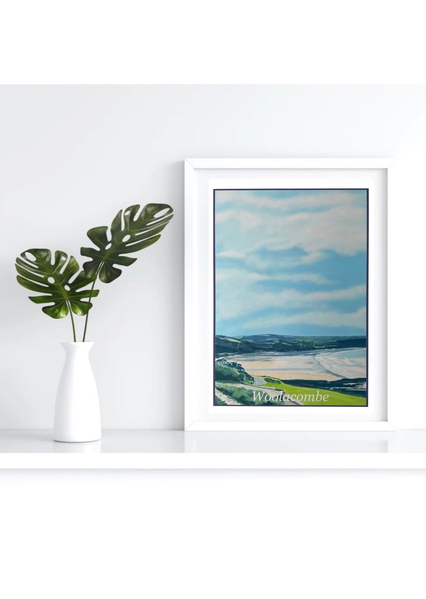 an art print of Woolacombe in North Devon by Jagos Art featuring the sea front and the fields in the distance