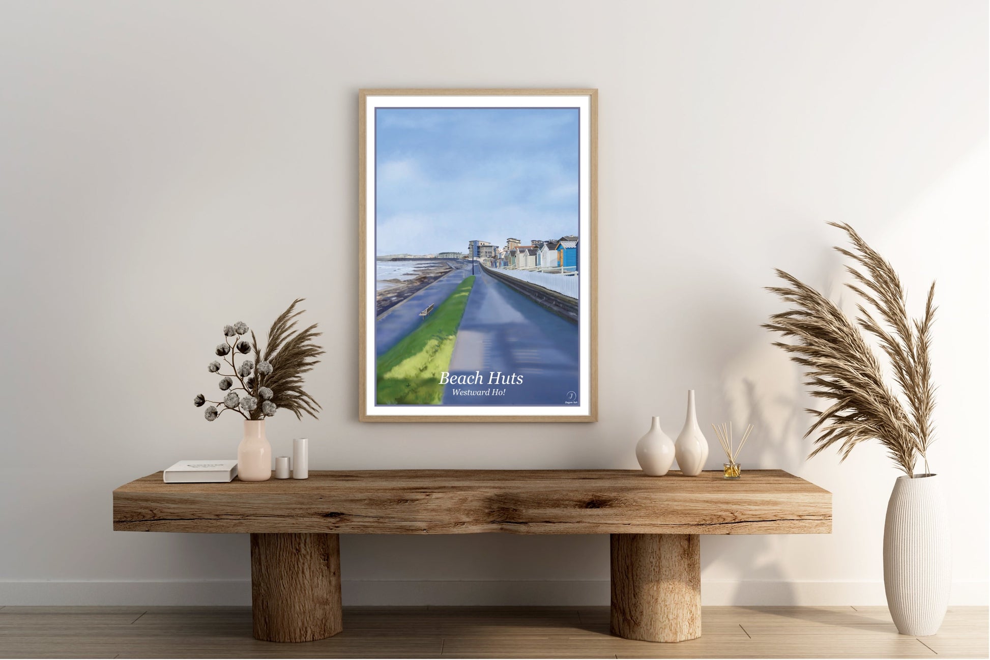 An art print by Jagos Art featuring the Beach Huts in Westward Ho North Devon England drawn in the style of the old vintage railway posters primarily blue and purple in colour