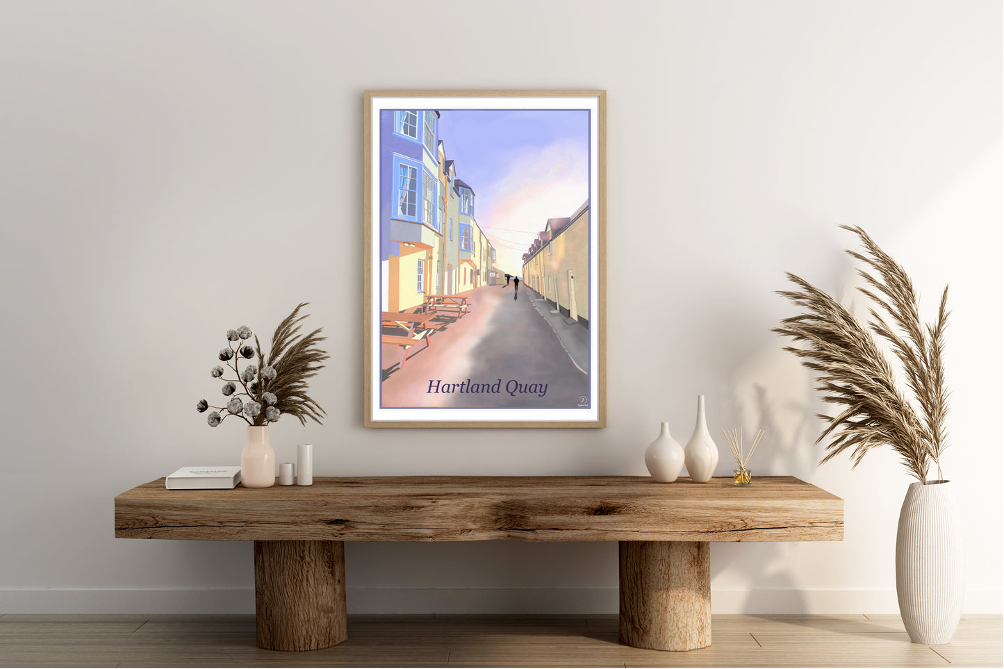 An art print featuring Hartland Quay in North Devon England showing the old Hotel and fisherman cottages capturing the charm of the past primarily in purple pink and yellow tones