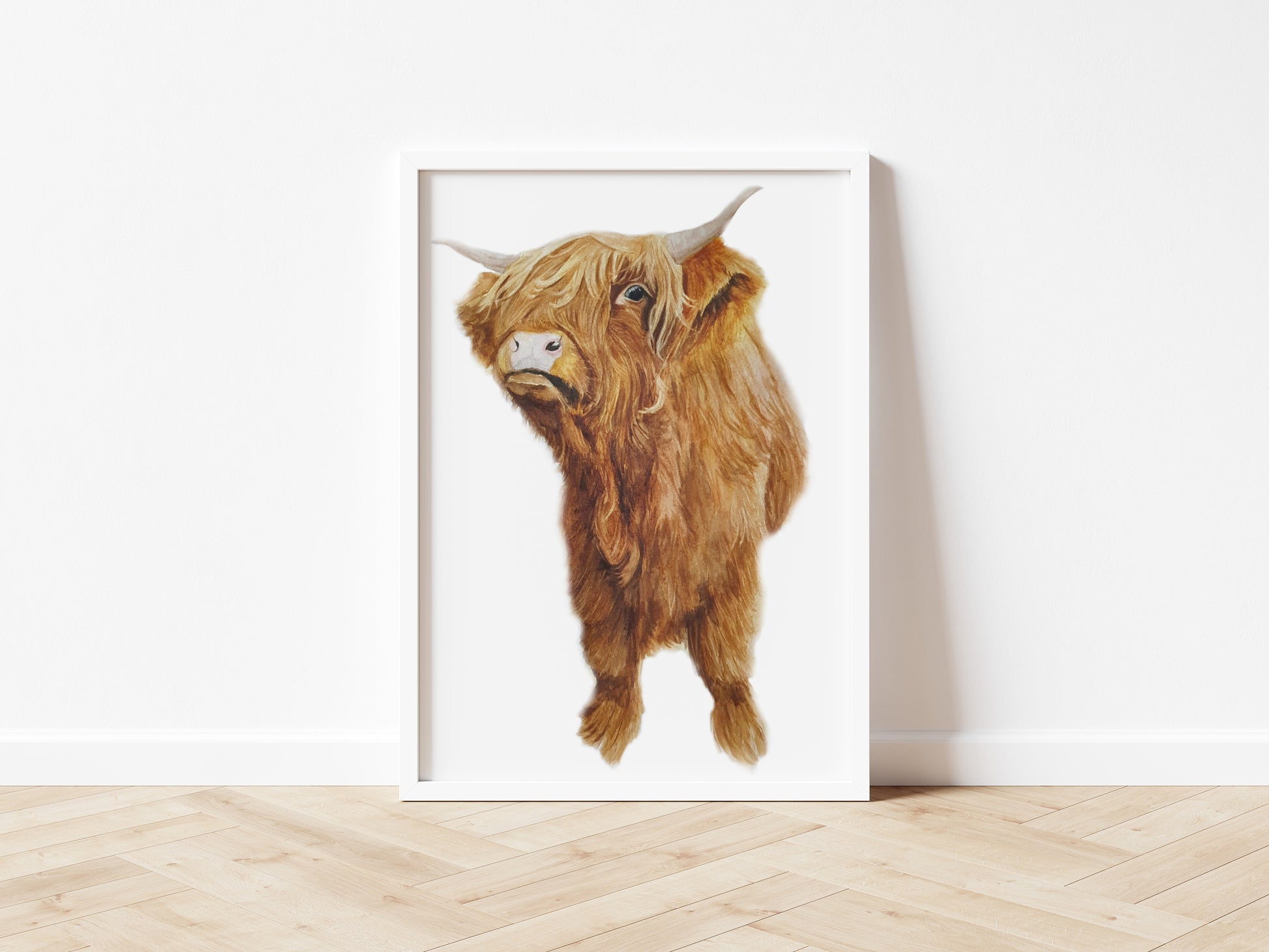 An art print of an original watercolour painting of a young Highland Cow painted primarily in brown and orange tones