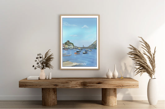 An art print of Ilfracombe Harbour showing the harbour with several fishing points moored up, some buildings, the cliffs and the Verity statue in the distance the primary colour being blue painted in the style of the old vintage railway posters