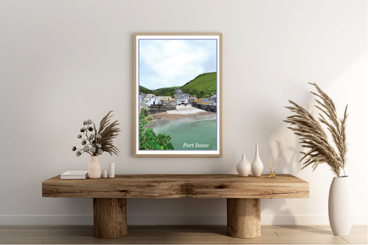 An art print of Port Isaac Cornwall England featuring a view looking down onto the village from the sea wall looking down on the beach and old buildings with their unique character and the hillside in the background drawn in the style of the old vintage railway posters