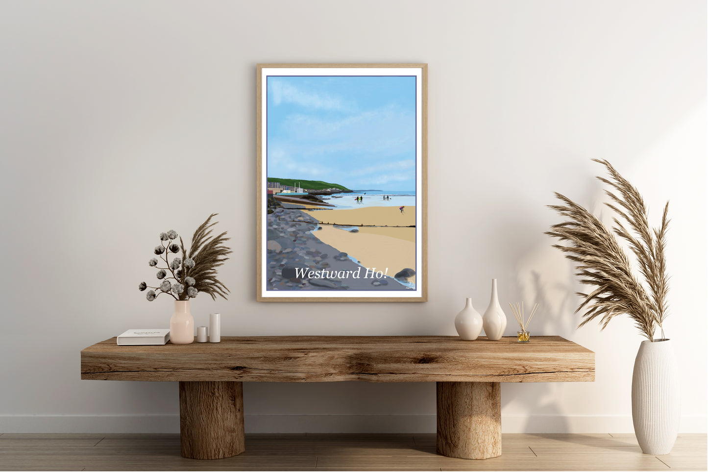 An art print of Westward Ho North Devon England featuring the beach the pebbleridge the slipway and the cliffs in the distance painted in the style of the old vintage railway posters